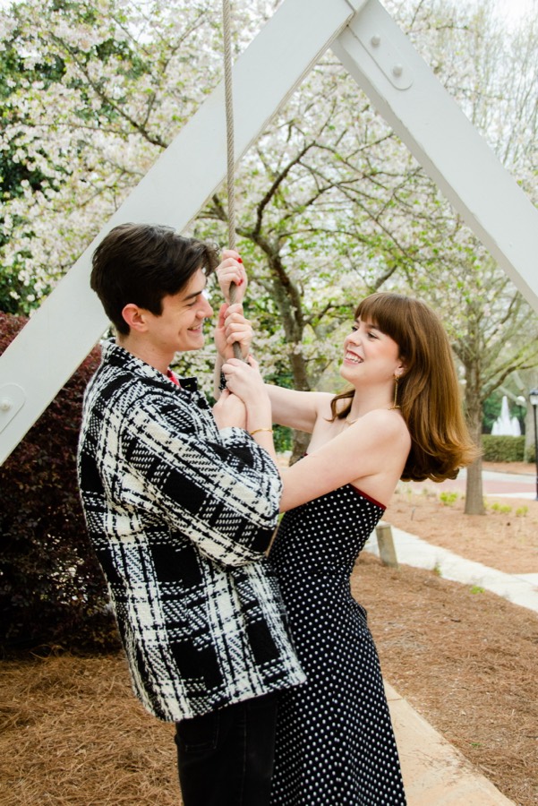 Elizabeth and Nicholas ringing the Chapel Bell at UGA after graduating.